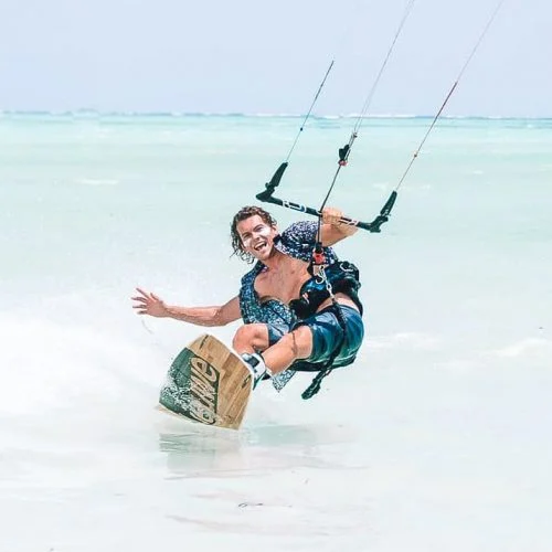 Mineral Sunscreen - Man kite surfing on beach - Suntribe Reef Safe Sunscreen-1 (1)